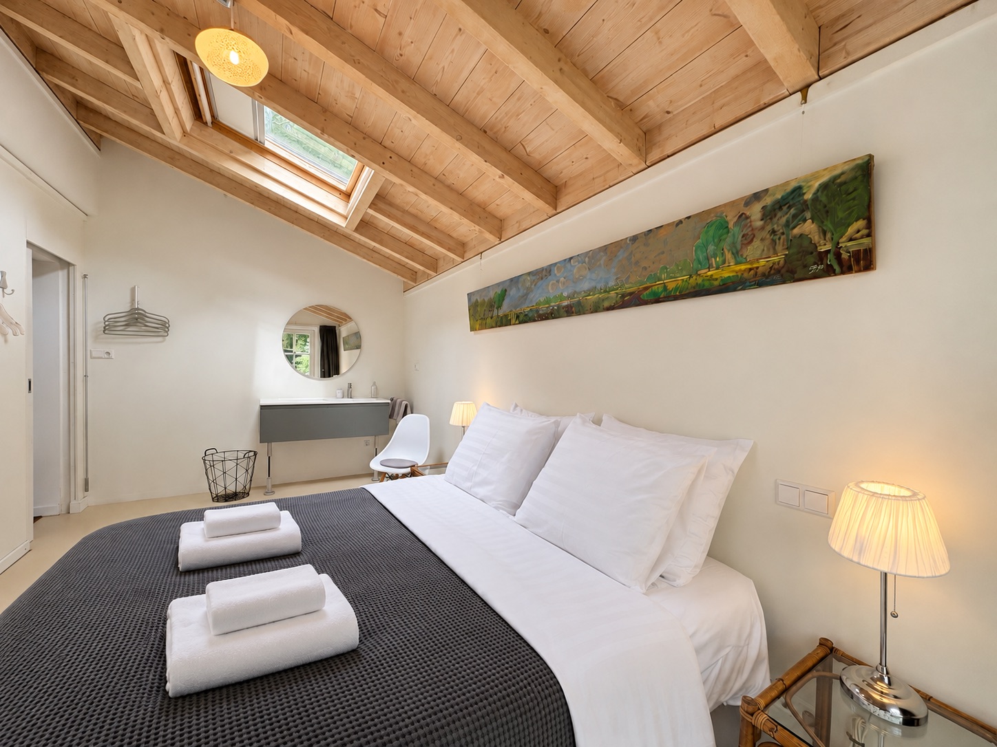 Sleeping beneath the skylight and wooden beams